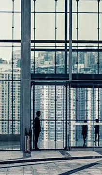 businessman standing in contemporary office